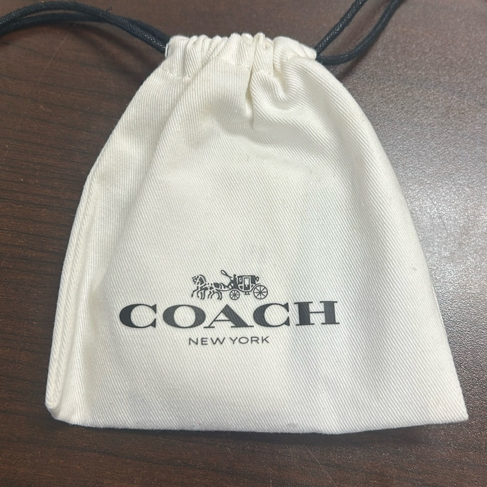 Silver slider bracelet from coach never worn.